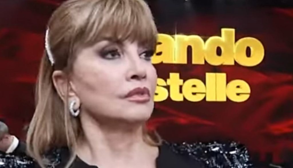 Milly Carlucci seria (Rai - youtube screenshot) - www.insolenzadir2d2.it